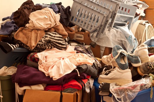 Office furniture being carefully removed by clearance experts